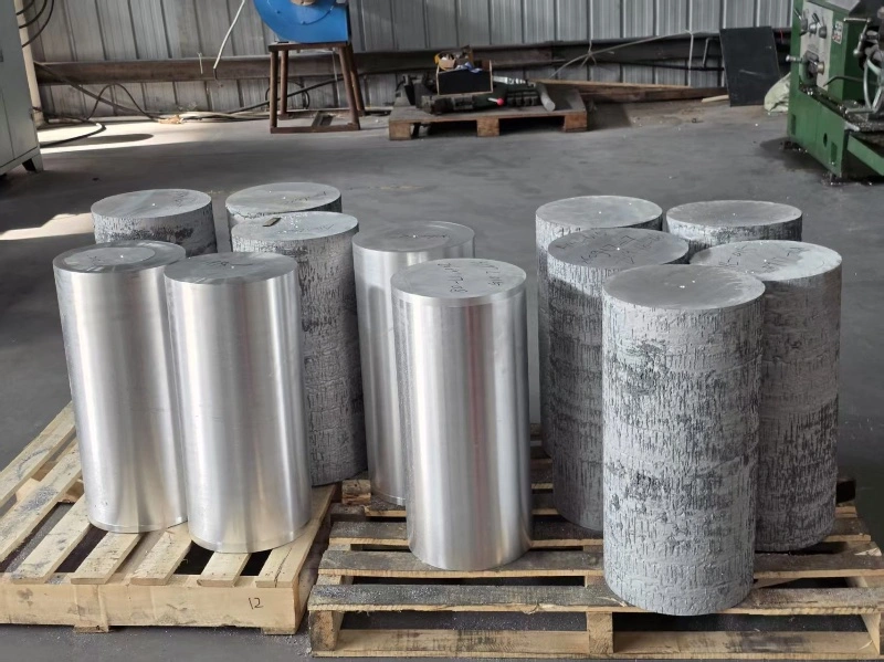 Dissolvable magnesium alloy billets staged for extrusion