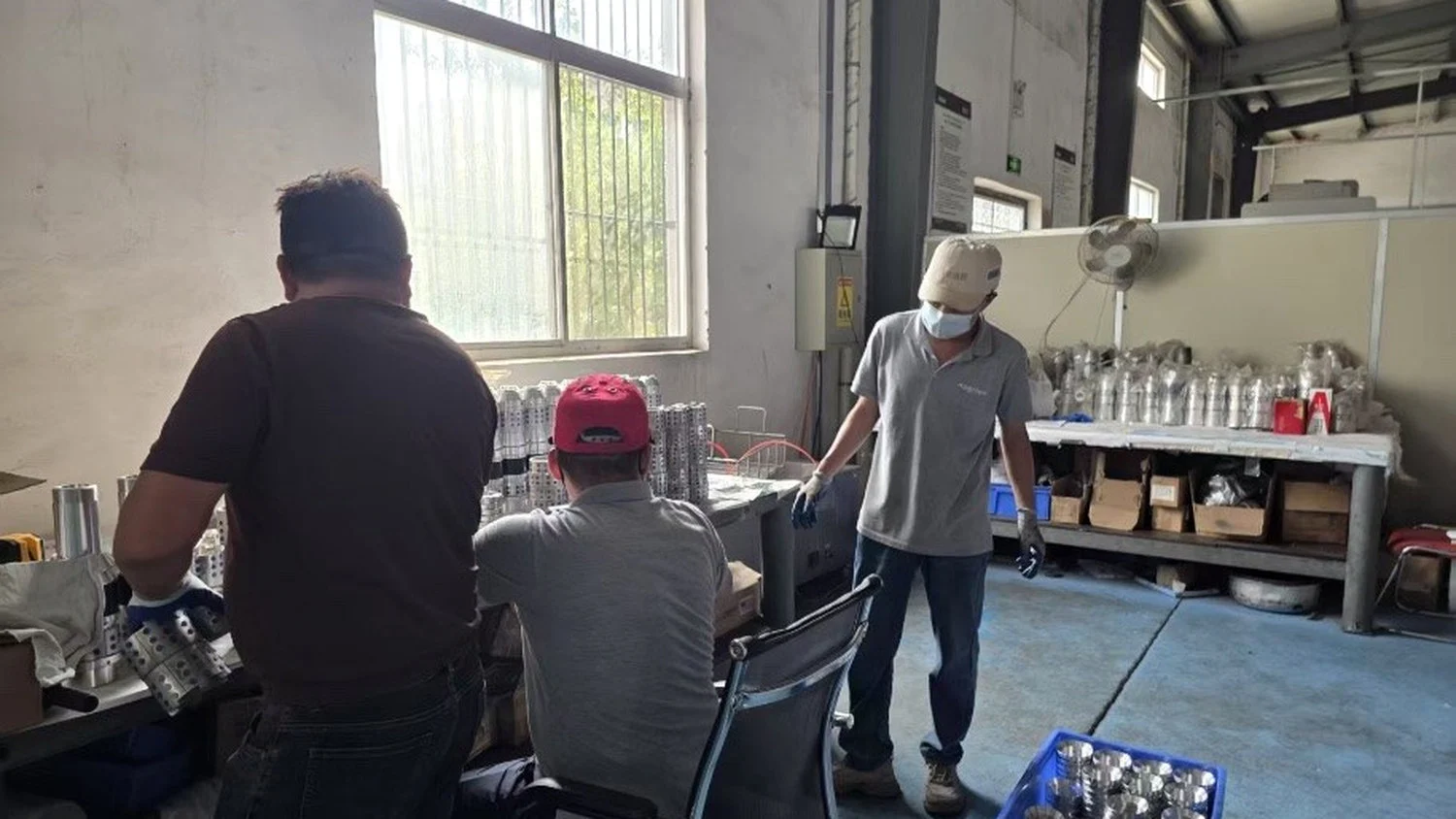 HAGRIEN bridge plug components and workers in manufacturing workshop